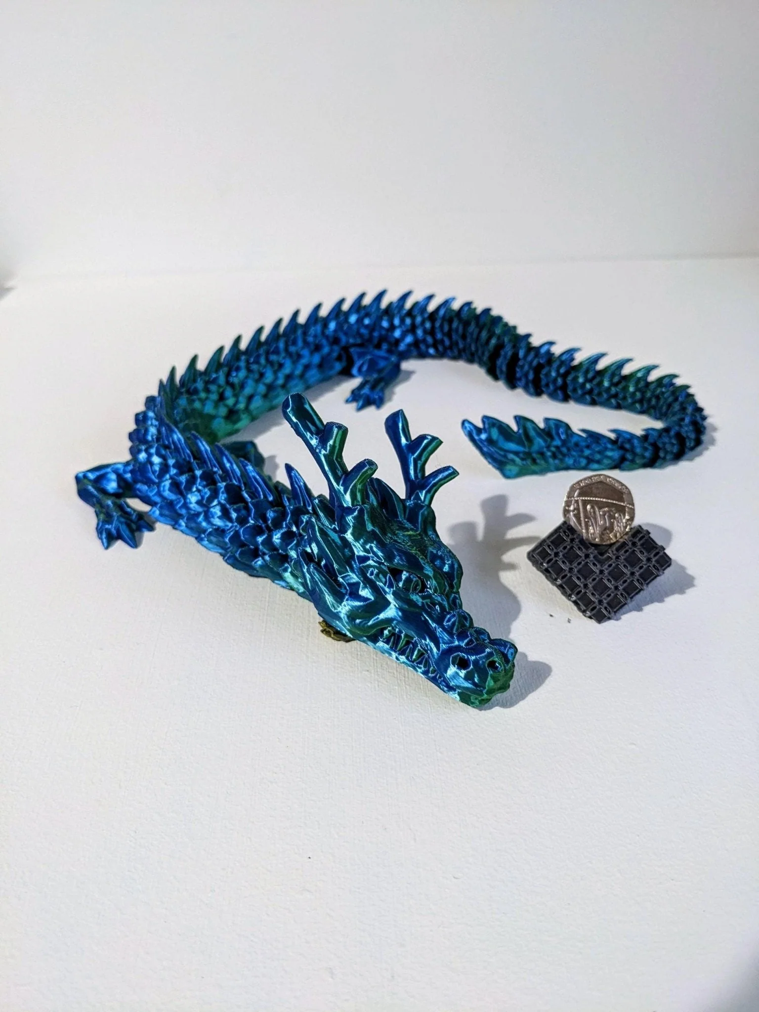Articulated Crystal slinky  Dragon 3d printed  horned fidget toy. UK  MADE