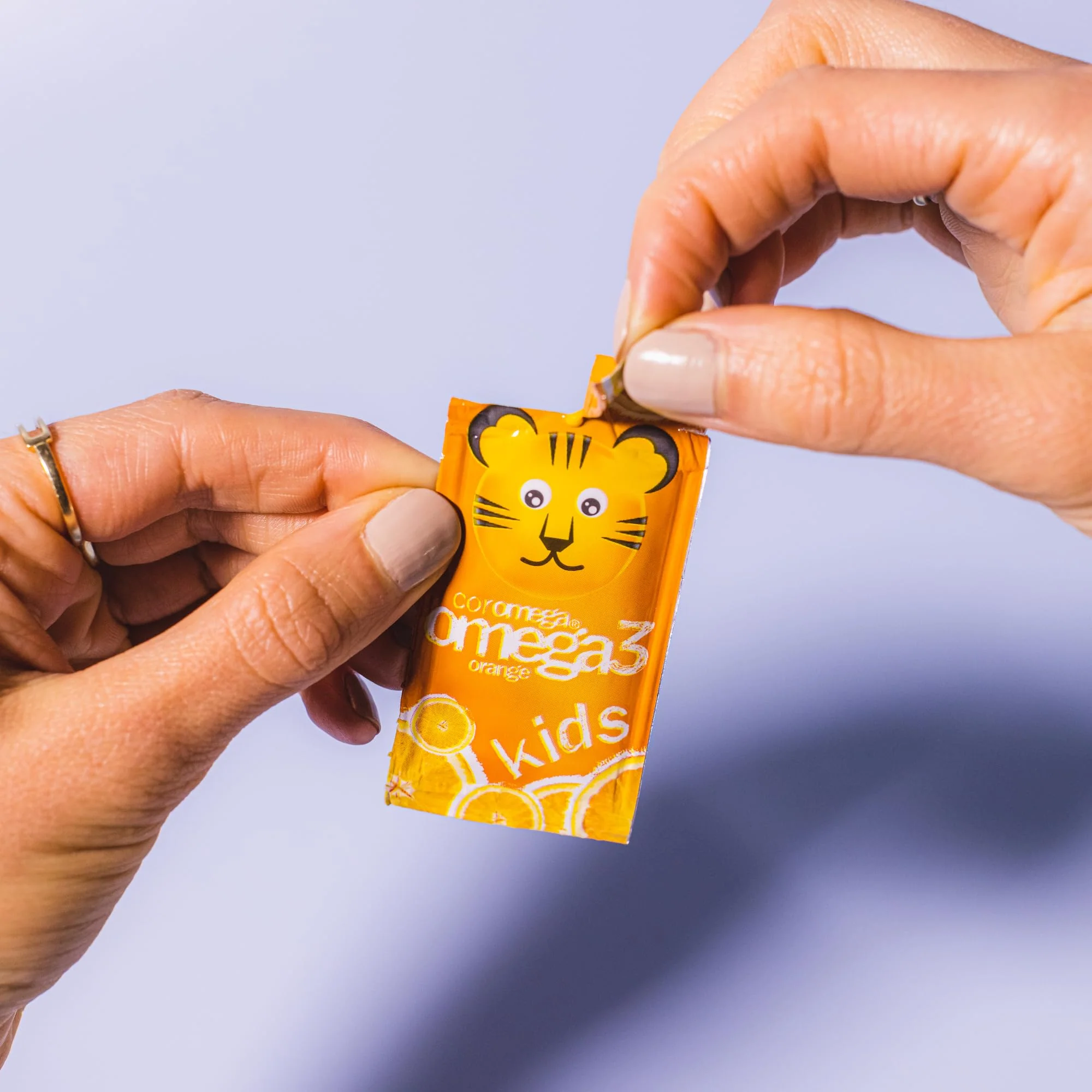 Coromega Kids Omega-3 Fish Oil 650mg – Tropical Orange + Vitamin D, 120 Squeeze Packets - Image 3
